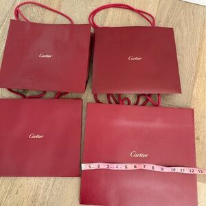 4 Cartier bags